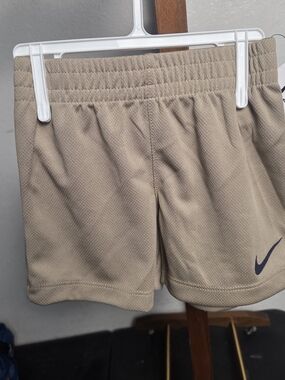 Nike Beige Athletic Shorts with Swoosh